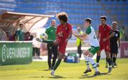 24 July 2019; Tomás Tavares of Portugal and Ciaran Brennan of Republic of Ireland during the 2019 UEFA U19 Championships semi-final match between Portugal and Republic of Ireland at Banants Stadium in Yerevan, Armenia. Photo by Stephen McCarthy/Sportsfile