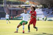 24 July 2019; Ali Reghba of Republic of Ireland and Tomás Tavares of Portugal during the 2019 UEFA U19 Championships semi-final match between Portugal and Republic of Ireland at Banants Stadium in Yerevan, Armenia. Photo by Stephen McCarthy/Sportsfile