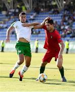 24 July 2019; Ali Reghba of Republic of Ireland and Gonçalo Loureiro of Portugal during the 2019 UEFA U19 Championships semi-final match between Portugal and Republic of Ireland at Banants Stadium in Yerevan, Armenia. Photo by Stephen McCarthy/Sportsfile