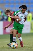 24 July 2019; Tyreik Wright of Republic of Ireland and Costinha of Portugal during the 2019 UEFA U19 Championships semi-final match between Portugal and Republic of Ireland at Banants Stadium in Yerevan, Armenia. Photo by Stephen McCarthy/Sportsfile