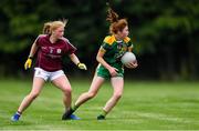 24 July 2019; Ciara Smyth of Meath in action against Samantha Fahy of Galway during the All-Ireland U16 ‘A’ Championship Final 2019 match between Galway and Meath at St Rynagh's in Banagher, Co Offaly. Photo by Piaras Ó Mídheach/Sportsfile
