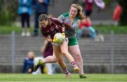 24 July 2019; Eva Noone  of Galway in action against Aoibheann Corcoran of Meath during the All-Ireland U16 ‘A’ Championship Final 2019 match between Galway and Meath at St Rynagh's in Banagher, Co Offaly. Photo by Piaras Ó Mídheach/Sportsfile
