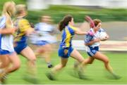 24 July 2019; Aine O'Neill of Waterford  in action against Leah Shannon of Longford during the All-Ireland U16 ‘B’ Championship Final 2019 match between Longford and Waterford at St Brendans Park in Birr, Co Offaly. Photo by David Fitzgerald/Sportsfile