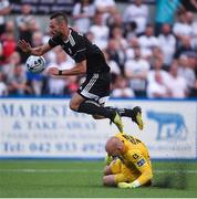 24 July 2019; Simeon Slavchev of Qarabag FK is tackled by Gary Rogers of Dundalk during the UEFA Champions League Second Qualifying Round 1st Leg match between Dundalk and Qarabag FK at Oriel Park in Dundalk, Louth. Photo by Ben McShane/Sportsfile