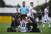 24 July 2019; Robbie Benson of Dundalk is treated for an injury during the UEFA Champions League Second Qualifying Round 1st Leg match between Dundalk and Qarabag FK at Oriel Park in Dundalk, Louth. Photo by Ben McShane/Sportsfile