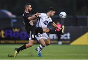 24 July 2019; Simeon Slavchev of Qarabag FK in action against Patrick Hoban of Dundalk during the UEFA Champions League Second Qualifying Round 1st Leg match between Dundalk and Qarabag FK at Oriel Park in Dundalk, Louth. Photo by Ben McShane/Sportsfile