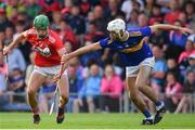 23 July 2019; Brian Turnbull of Cork in action against Craig Morgan of Tipperary during the Bord Gais Energy Munster GAA Hurling Under 20 Championship Final match between Tipperary and Cork at Semple Stadium in Thurles, Co Tipperary. Photo by Sam Barnes/Sportsfile