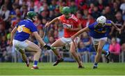 23 July 2019; Brian Turnbull of Cork in action against Craig Morgan, right, and Paddy Cadell of Tipperary during the Bord Gais Energy Munster GAA Hurling Under 20 Championship Final match between Tipperary and Cork at Semple Stadium in Thurles, Co Tipperary. Photo by Sam Barnes/Sportsfile