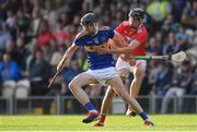 23 July 2019; Gearóid O'Connor of Tipperary in action against Robert Downey of Cork during the Bord Gais Energy Munster GAA Hurling Under 20 Championship Final match between Tipperary and Cork at Semple Stadium in Thurles, Co Tipperary. Photo by Sam Barnes/Sportsfile