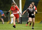 24 July 2019; Laoise McElroy of Louth in action against Cora Gilligan of Sligo during the All-Ireland U16 ‘C’ Championship Final 2019 match between Louth and Sligo at Mullahoran in Co Cavan. Photo by Oliver McVeigh/Sportsfile
