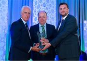 26 July 2019; John O'Neill is presented with the John Sherlock Services to Football award by Republic of Ireland manager Mick McCarthy and Adrian Sherlock, son of John Sherlock, on behalf of his father PJ O'Neill, Carrick-on-Suir AFC, Tipperary, during the FAI Delegates Dinner and Communications Awards at Knightsbrook Hotel in Trim, Meath. Photo by Seb Daly/Sportsfile