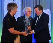 26 July 2019; Brother Bernard Twomey, is presented with the Jeremy Dee Services to Women's Football award by FAI Board Member Niamh O'Donoghue, Chairperson of the Women's Football Committee, and FAI President Donal Conway during the FAI Delegates Dinner and Communications Awards at Knightsbrook Hotel in Trim, Meath. Photo by Seb Daly/Sportsfile