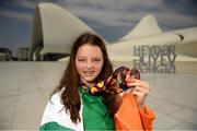 27 July 2019; Molly Mayne of Ireland poses for a portrait with her 100m breaststroke and 200m breaststroke bronze medals in front of the Heydar Aliyev Center in Baku during Day Six of the 2019 Summer European Youth Olympic Festival in Baku, Azerbaijan. Photo by Eóin Noonan/Sportsfile