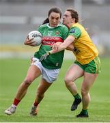 27 July 2019; Niamh Kelly of Mayo in action against Niamh Carr of Donegal during the TG4 All-Ireland Ladies Football Senior Championship Group 4 Round 3 match between Donegal and Mayo at Bord Na Mona O'Connor Park in Tullamore, Offaly. Photo by Ben McShane/Sportsfile