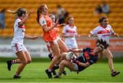 27 July 2019; Martina O'Brien of Cork makes a save despite the shot of Blaithin Mackin of Armagh during the TG4 All-Ireland Ladies Football Senior Championship Group 1 Round 3 match between Armagh and Cork at Bord Na Mona O'Connor Park in Tullamore, Offaly. Photo by Ben McShane/Sportsfile