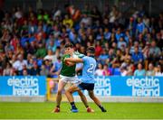 27 July 2019; Eoin Gilraine of Mayo in action against Ross Keogh of Dublin during the Electric Ireland GAA Football All-Ireland Minor Championship Quarter-Final match between Mayo and Dublin at Glennon Brothers Pearse Park in Longford. Photo by Seb Daly/Sportsfile