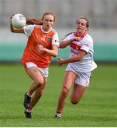 27 July 2019; Blaithin Mackin of Armagh in action against Chloe Collins of Cork during the TG4 All-Ireland Ladies Football Senior Championship Group 1 Round 3 match between Armagh and Cork at Bord Na Mona O'Connor Park in Tullamore, Offaly. Photo by Ben McShane/Sportsfile