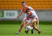 27 July 2019; Melissa Duggan of Cork in action against Sarah Marley of Armagh during the TG4 All-Ireland Ladies Football Senior Championship Group 1 Round 3 match between Armagh and Cork at Bord Na Mona O'Connor Park in Tullamore, Offaly. Photo by Ben McShane/Sportsfile