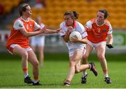 27 July 2019; Melissa Duggan of Cork in action against Sarah Marley, right, and Aoife McCoy of Armagh during the TG4 All-Ireland Ladies Football Senior Championship Group 1 Round 3 match between Armagh and Cork at Bord Na Mona O'Connor Park in Tullamore, Offaly. Photo by Ben McShane/Sportsfile