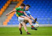 27 July 2019; Ruairí Keane of Mayo shoots to score his side's fourth goal of the game, despite pressure from Alex Watson of Dublin, during the Electric Ireland GAA Football All-Ireland Minor Championship Quarter-Final match between Mayo and Dublin at Glennon Brothers Pearse Park in Longford. Photo by Seb Daly/Sportsfile