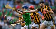 27 July 2019; Eddie Stokes of Limerick gets away from Zach Bay Hammond, centre, and Padraic Moylan of Kilkenny during the Electric Ireland GAA Hurling All-Ireland Minor Championship Semi-Final match between Kilkenny and Limerick at Croke Park in Dublin. Photo by Piaras Ó Mídheach/Sportsfile