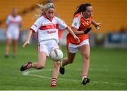 27 July 2019; Orla Finn of Cork in action against Megan Sheridan of Armagh during the TG4 All-Ireland Ladies Football Senior Championship Group 1 Round 3 match between Armagh and Cork at Bord Na Mona O'Connor Park in Tullamore, Offaly. Photo by Ben McShane/Sportsfile