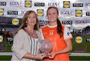 27 July 2019; Blaithin Mackin of Armagh receives the Player of the Match award from Helen O’Rourke, Ladies Gaelic Football Association CEO, following the TG4 All-Ireland Ladies Senior Football Championship Group 1 Round 3 fixture between Armagh and Cork at Bord na Móna O’Connor Park, Tullamore, Co. Offaly. Photo by Ben McShane/Sportsfile
