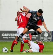 27 July 2019; Jamie McGrath of Dundalk in action against Kevin Toner and James Doona of St Patrick's Athletic during the SSE Airtricity League Premier Division match between St Patrick's Athletic and Dundalk at Richmond Park in Dublin. Photo by Michael P Ryan/Sportsfile