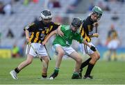 27 July 2019; Cian Cronin, Ballyhass National School, Mallow, Cork, representing Limerick, in action against Cahir Keyes, All Saints’ PS, Omagh, Tyrone, representing Kilkenny, and Cormac Simpson, Murrintown NS, Murrintown, Wexford, representing Kilkenny, during the INTO Cumann na mBunscol GAA Respect Exhibition Go Games at the GAA Hurling All-Ireland Senior Championship Semi-Final match between Limerick and Kilkenny at Croke Park in Dublin. Photo by Ramsey Cardy/Sportsfile