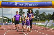 28 July 2019; Marian and Rob Heffernan with their daughters Tara and Regan, front, celebrate at the finish line during the Athletics Ireland Festival of Running at Morton Stadium in Santry, Dublin. Photo by Harry Murphy/Sportsfile