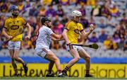 28 July 2019; Jack Kirwan of Wexford in action against Alex Connaire of Galway during the Electric Ireland GAA Hurling All-Ireland Minor Championship Semi-Final match between Wexford and Galway at Croke Park in Dublin. Photo by Brendan Moran/Sportsfile