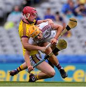 28 July 2019; Shane Morgan of Galway is tackled by Kyle Scallan of Wexford during the Electric Ireland GAA Hurling All-Ireland Minor Championship Semi-Final match between Wexford and Galway at Croke Park in Dublin. Photo by Brendan Moran/Sportsfile