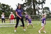 28 July 2019; Marian Heffernan leads a warm up with her daughters Tara and Regan during the Athletics Ireland Festival of Running at Morton Stadium in Santry, Dublin. Photo by Sam Barnes/Sportsfile