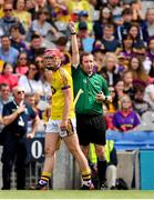 28 July 2019; Kyle Scallan of Wexford is shown a red card by referee Colm Cunning during the Electric Ireland GAA Hurling All-Ireland Minor Championship Semi-Final match between Wexford and Galway at Croke Park in Dublin. Photo by Brendan Moran/Sportsfile