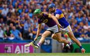 28 July 2019; Matthew O'Hanlon of Wexford in action against Jason Forde of Tipperary during the GAA Hurling All-Ireland Senior Championship Semi Final match between Wexford and Tipperary at Croke Park in Dublin. Photo by Brendan Moran/Sportsfile