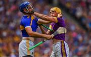 28 July 2019; Damien Reck of Wexford, right, in action against John McGrath of Tipperary during the GAA Hurling All-Ireland Senior Championship Semi Final match between Wexford and Tipperary at Croke Park in Dublin. Photo by Brendan Moran/Sportsfile