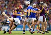 28 July 2019; Lee Chin of Wexford tussles with Barry Heffernan of Tipperary during the GAA Hurling All-Ireland Senior Championship Semi Final match between Wexford and Tipperary at Croke Park in Dublin. Photo by Ramsey Cardy/Sportsfile