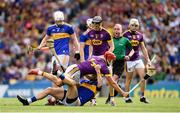 28 July 2019; Lee Chin of Wexford tussles with Barry Heffernan of Tipperary during the GAA Hurling All-Ireland Senior Championship Semi Final match between Wexford and Tipperary at Croke Park in Dublin. Photo by Ramsey Cardy/Sportsfile