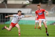 28 July 2019; Brian Hartnett of Cork in action against Damien McGuigan of Tyrone during the EirGrid GAA Football All-Ireland U20 Championship Semi-Final match between Cork and Tyrone at Bord Na Mona O'Connor Park in Tullamore, Offaly. Photo by David Fitzgerald/Sportsfile