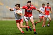 28 July 2019; Mark McKearney of Tyrone in action against Mark Cronin of Cork during the EirGrid GAA Football All-Ireland U20 Championship Semi-Final match between Cork and Tyrone at Bord Na Mona O'Connor Park in Tullamore, Offaly. Photo by David Fitzgerald/Sportsfile