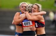 28 July 2019; Sarah Lavin of U.C.D. A.C., Co. Dublin, left, celebrates with Sarah Quinn of St. Colmans South Mayo A.C., Co. Mayo, centre, and Lilly-ann O'Hora of Dooneen A.C., Co. Limerick, following the Women's 100m Hurdles during day two of the Irish Life Health National Senior Track & Field Championships at Morton Stadium in Santry, Dublin. Photo by Sam Barnes/Sportsfile