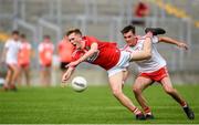 28 July 2019; Brian Hartnett of Cork in action against Darragh Canavan of Tyrone during the EirGrid GAA Football All-Ireland U20 Championship Semi-Final match between Cork and Tyrone at Bord Na Mona O'Connor Park in Tullamore, Offaly. Photo by David Fitzgerald/Sportsfile