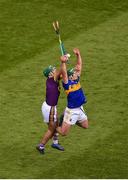 28 July 2019; Alan Flynn of Tipperary in action against Shaun Murphy of Wexford during the GAA Hurling All-Ireland Senior Championship Semi Final match between Wexford and Tipperary at Croke Park in Dublin. Photo by Daire Brennan/Sportsfile