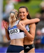 28 July 2019; Ciara Neville of Emerald A.C., Co. Limerick, right, is congratulated by Aoife Lynch of Donore Harriers, Co. Dublin, left, after winning the Women's 100m, during day two of the Irish Life Health National Senior Track & Field Championships at Morton Stadium in Santry, Dublin. Photo by Sam Barnes/Sportsfile