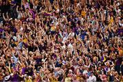 28 July 2019; Wexford supporters, in the Hogan Stand, celebrate their side's third goal during the GAA Hurling All-Ireland Senior Championship Semi Final match between Wexford and Tipperary at Croke Park in Dublin. Photo by Ray McManus/Sportsfile