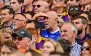 28 July 2019; A Tipperary supporter, amongst may Wexford supporters, watches the GAA Hurling All-Ireland Senior Championship Semi Final match between Wexford and Tipperary at Croke Park in Dublin. Photo by Ray McManus/Sportsfile