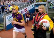 28 July 2019; RNLI volunteer lifeboat crew from stations across Ireland unfurl giant water safety flags on the pitch of Croke Park before the All-Ireland Senior Hurling semi-final match between Wexford and Tipperary at Croke Park in Dublin. The activity was part of the RNLI’s partnership with the GAA to prevent drownings and share water safety advice. Photo by Ramsey Cardy/Sportsfile