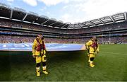 28 July 2019; RNLI volunteer lifeboat crew from stations across Ireland unfurl giant water safety flags on the pitch of Croke Park before the All-Ireland Senior Hurling semi-final match between Wexford and Tipperary at Croke Park in Dublin. The activity was part of the RNLI’s partnership with the GAA to prevent drownings and share water safety advice. Photo by Ramsey Cardy/Sportsfile