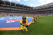 28 July 2019; RNLI volunteer lifeboat crew from stations across Ireland unfurl giant water safety flags on the pitch of Croke Park before the All-Ireland Senior Hurling semi-final match between Wexford and Tipperary at Croke Park in Dublin. The activity was part of the RNLI’s partnership with the GAA to prevent drownings and share water safety advice. Photo by Ramsey Cardy/Sportsfile