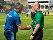28 July 2019; Tipperary manager Liam Sheedy shakes hands with referee Sean Cleere before the GAA Hurling All-Ireland Senior Championship Semi Final match between Wexford and Tipperary at Croke Park in Dublin. Photo by Ray McManus/Sportsfile